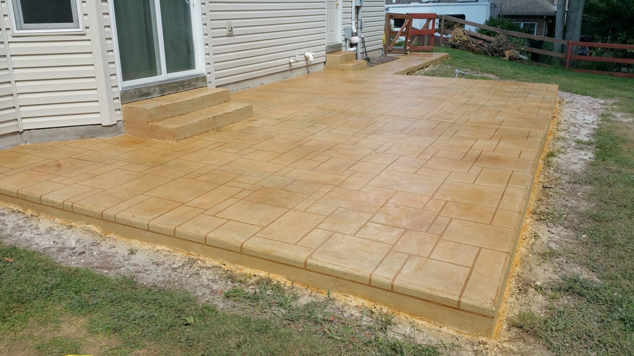 Light Brown Stained Concrete Patio Stamped Pattern Surecrete